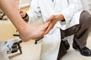 Podiatrist Checking Achilles Tendon