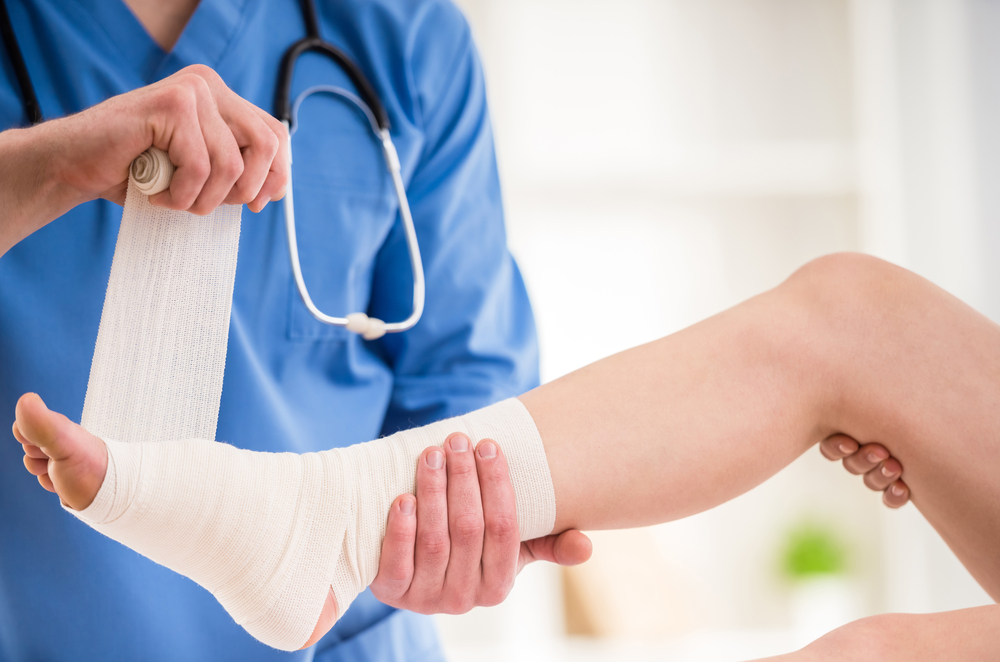 Podiatrist Examining Patient